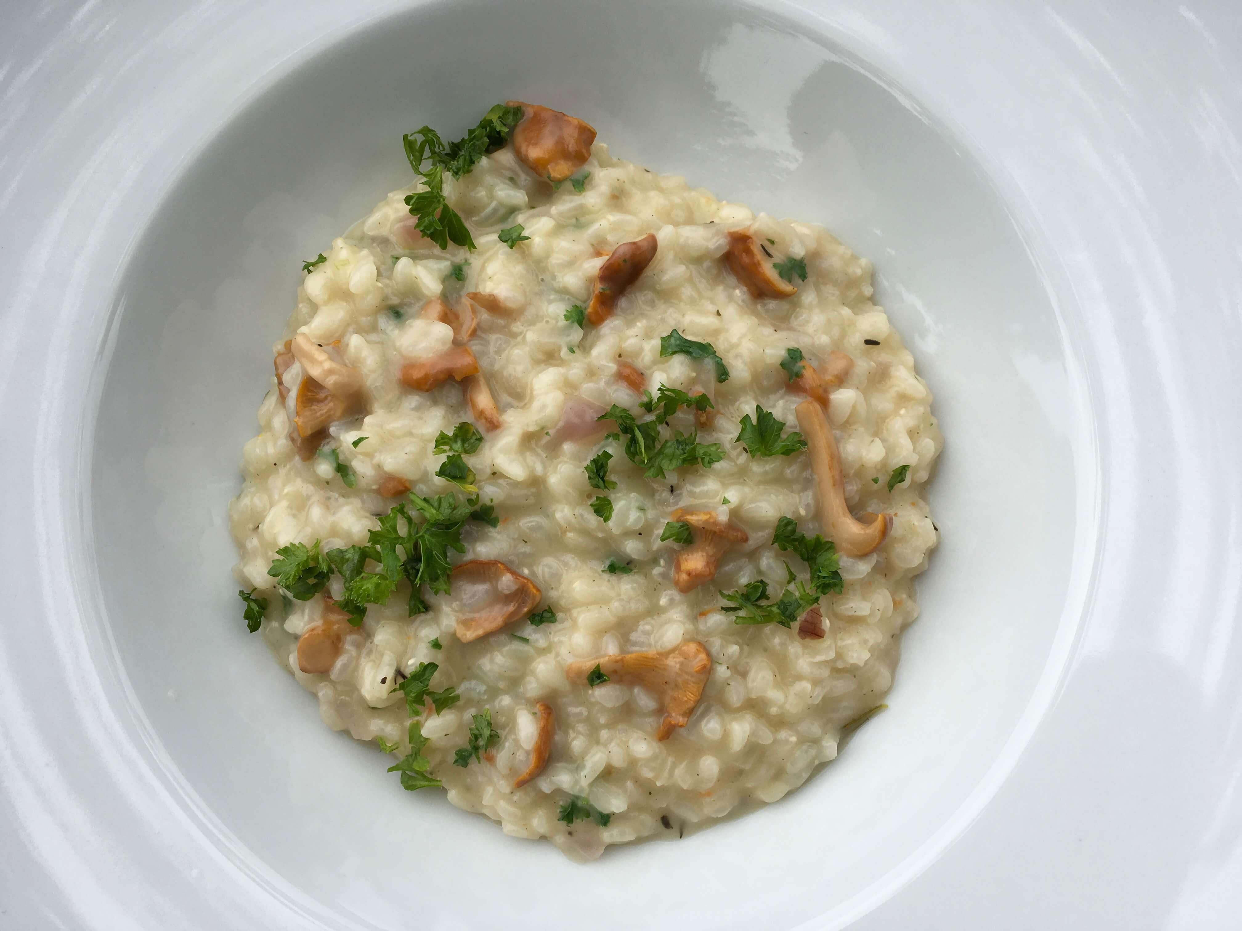 risotto med svampe og persille.