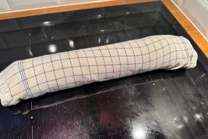 bunden pakket ind i viskestykket.